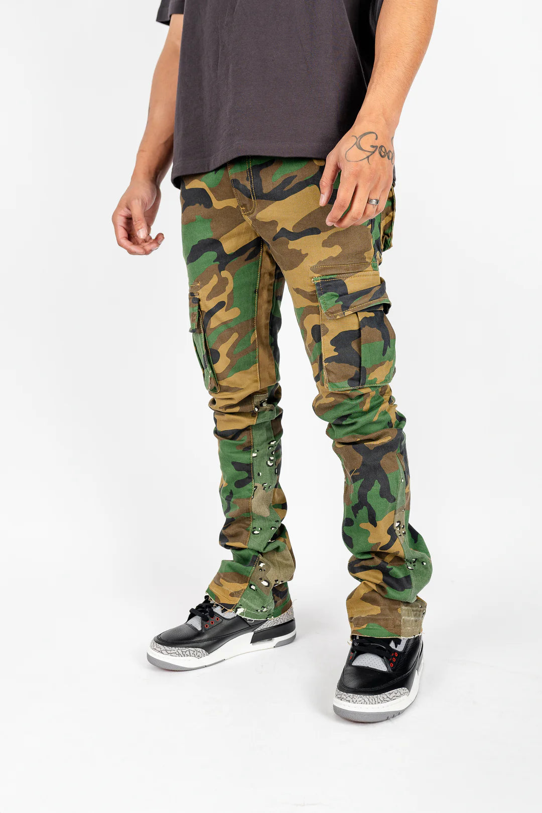 "CAMO STACKED FLARE JEANS"